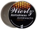 Zwarte blik met 'Wiertz Antiekwas' en afbeelding van honingraten. Deksel is open.