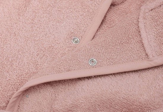 Tissu éponge rose avec fermeture à boutons-pression.