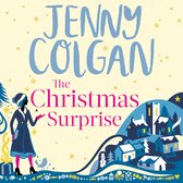 Boekcover van 'The Christmas Surprise' van Jenny Colgan. Een vrouw in winterkleding staat naast een cadeautje en een winterdorp.