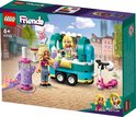 Doos met LEGO Friends mobiele bubbelthee stand: twee poppen, een mintgroene en gele foodtruck, een paarse bubbelthee-automaat en een roze scooter.