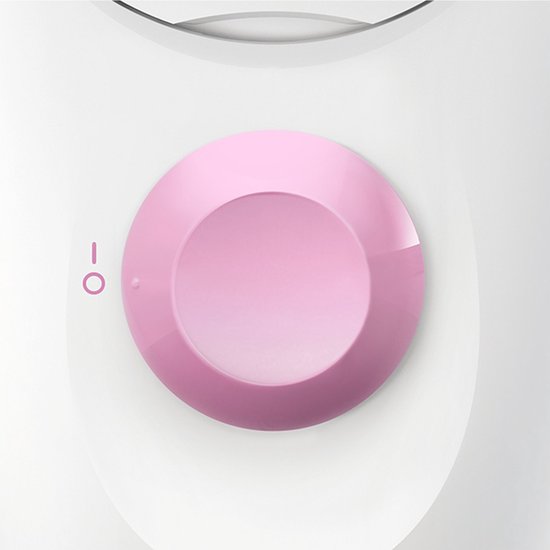 Close-up van de roze draaiknop van de Braun Silk-épil 1 epilator.