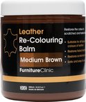 Pot 'Leather Re-Colouring Balm Medium Brown' van Furniture Clinic. Tekst op etiket: 'Restores the colour to scratched and faded leather. Suitable for all types and colours of leather. Restores faded leather. Restores scratched leather. Safe and easy to use.'
