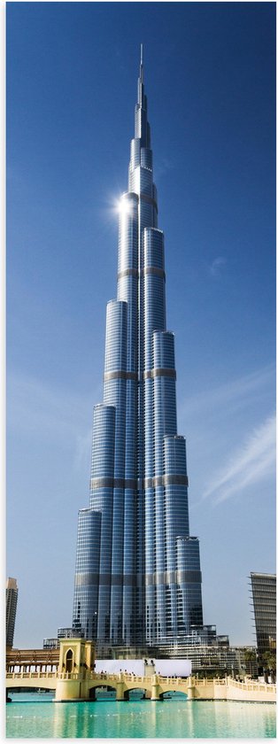 Poster Glanzend – Wolken en Zonlicht op Burj Khalifa Hotel - 20x60 cm Foto op Posterpapier met Glanzende Afwerking