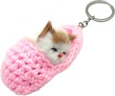 Un chat mignon et doux qui dort dans une pantoufle. Un joli porte-clés à attacher à votre trousseau de clés, sac ou sac à dos par exemple. Pour soi ou en cadeau.
