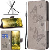 Mobigear Telefoonhoesje geschikt voor Xiaomi Redmi Note 11E Hoesje | Mobigear Butterfly Bookcase Portemonnee | Pasjeshouder voor 3 Pasjes | Telefoonhoesje voor Pinpas / OV Kaart / Rijbewijs - Grijs