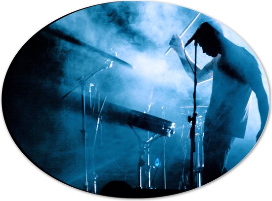 Dibond Ovaal - Drummer op Drumstel in Blauwe Rook tijdens Concert - 28x21 cm Foto op Ovaal (Met Ophangsysteem)