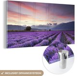 MuchoWow® Glasschilderij 40x20 cm - Schilderij acrylglas - Zonsondergang boven lavendels - Foto op glas - Schilderijen