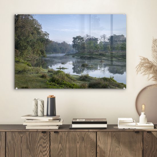 MuchoWow® Glasschilderij 60x40 cm - Schilderij acrylglas - Zonsopgang bij de rivier in het Nationaal park Chitwan in Nepal - Foto op glas - Schilderijen