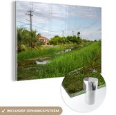 MuchoWow® Glasschilderij 90x60 cm - Schilderij acrylglas - Kanaal in het noorden van Paramaribo - Foto op glas - Schilderijen
