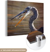 MuchoWow® Glasschilderij 80x60 cm - Schilderij acrylglas - Reiger met een prooi - Foto op glas - Schilderijen