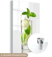 MuchoWow® Glasschilderij 80x120 cm - Schilderij acrylglas - Mojito cocktail op een witte achtergrond - Foto op glas - Schilderijen