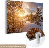 MuchoWow® Glasschilderij 180x120 cm - Schilderij acrylglas - Een winterlandschap tijdens een zonsondergang - Foto op glas - Schilderijen