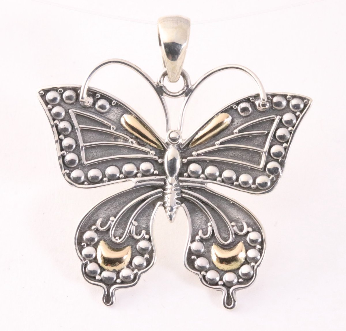 Grote zilveren vlinder hanger met 18k gouden decoraties