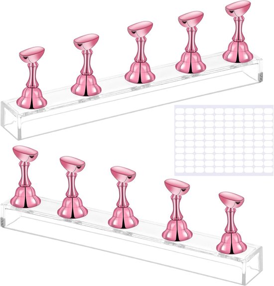 Twee acryl nageldisplaystandaarden met elk 5 roze magnetische nagelsteuntjes, naast een vel met witte dubbelzijdige stickers.