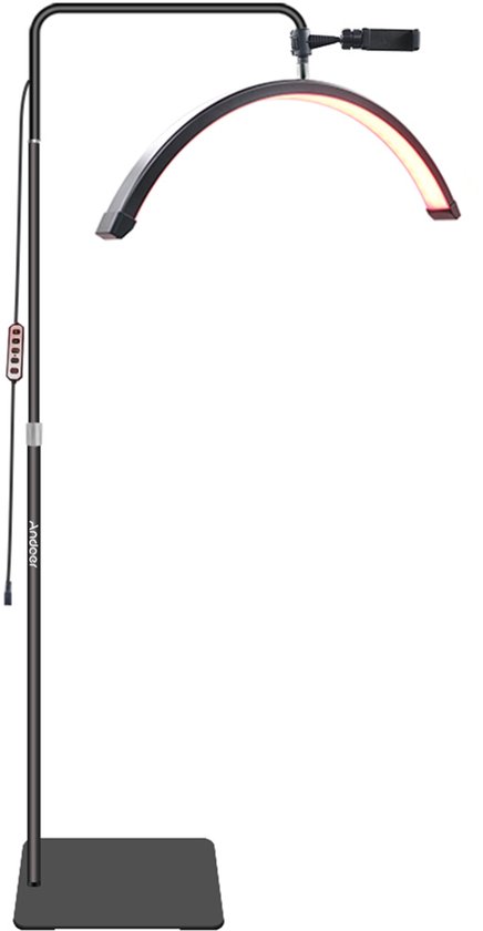 Zwarte boogvormige LED-lamp met statief, telefoonhouder en afstandsbediening.