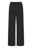 Achterkant van een zwarte, wijde broek met rechte pijpen en elastische tailleband.