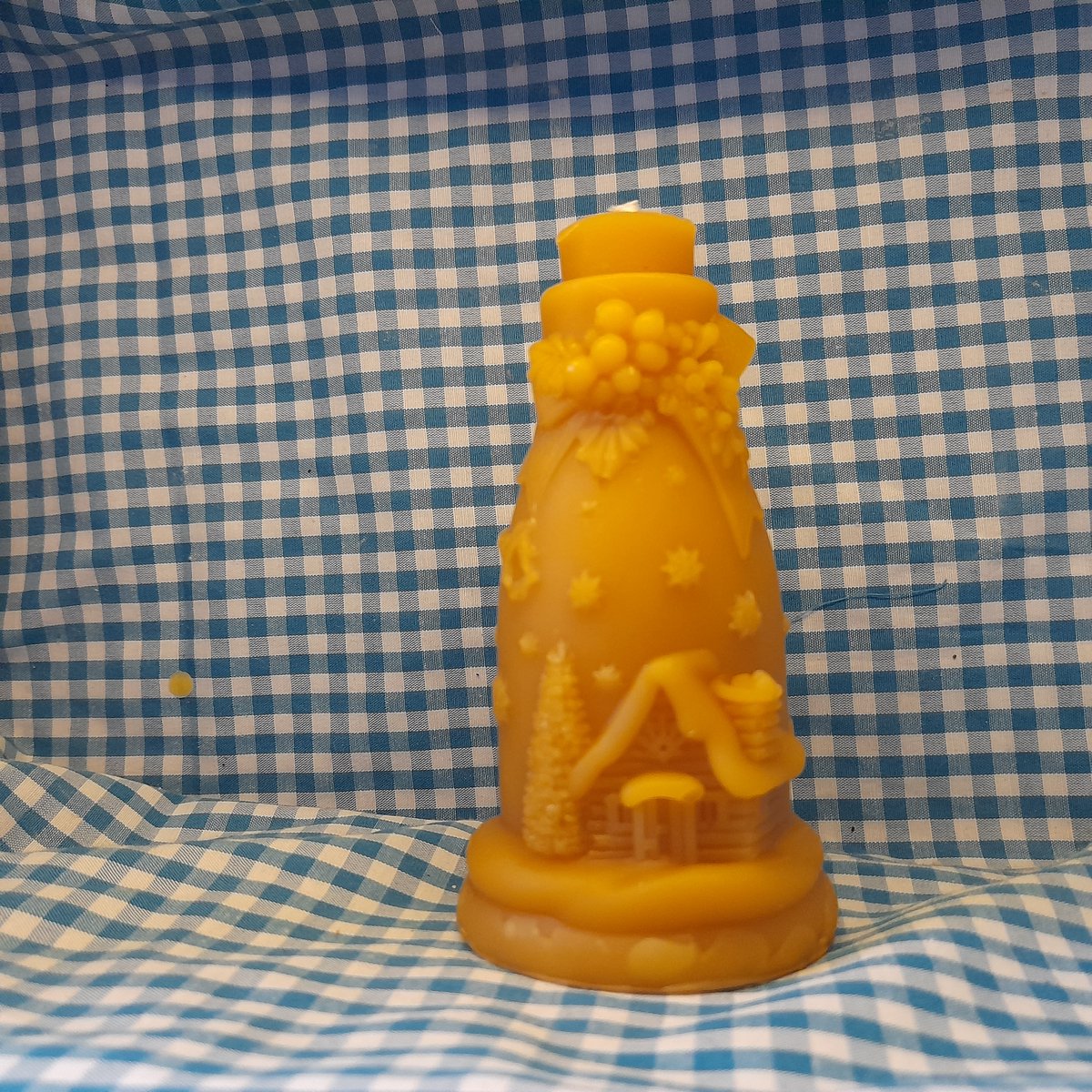 Bijenwas fles met kersthuisje
