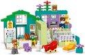 Maison Duplo verte et turquoise avec figurines, meubles, cuisine et chariot.