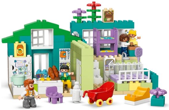 Maison Duplo verte et turquoise avec figurines, meubles, cuisine et chariot.