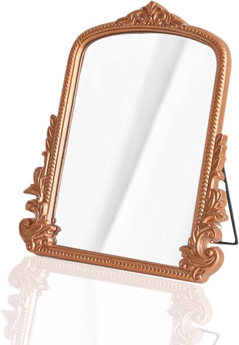 Decoratieve rosegouden make-upspiegel met gebogen frame