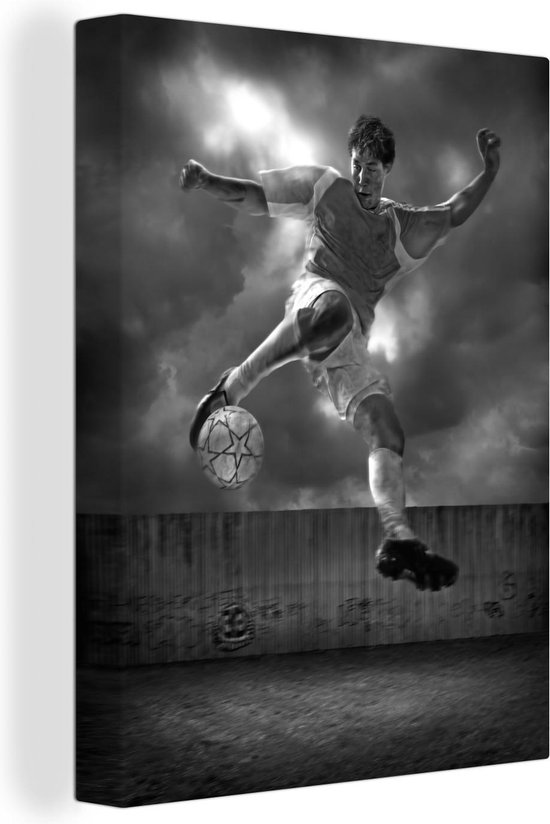 Tableau sur toile Une illustration d'un joueur de foot qui tape dans le  ballon -... | bol.com