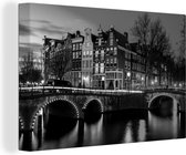 Canvas Schilderij De Keizersgracht in Amsterdam in de nacht - zwart wit - 90x60 cm - Wanddecoratie