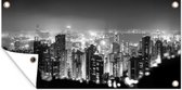 Tuinposter Een luchtfoto van Hong Kong in de nacht - zwart wit - 80x40 cm - Wanddecoratie Buiten - Tuinposter - Tuindoek - Schuttingposter - Tuinschilderij