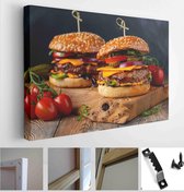 Two delicious homemade burgers of beef, cheese and vegetables on an old wooden table. Fat unhealthy food close-up - Modern Art Canvas - Horizontal - 1931683718 - 115*75 Horizontal