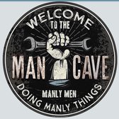 Welcome to the Man Cave.  Manly men doing manly things.  Metalen wandbord Ø 40 cm.