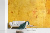 La texture d'un fotobehang mur jaune