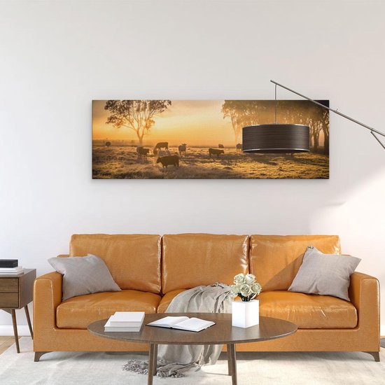 Artaza Canvas Schilderij Kudde Koeien In De Wei Met Zonsopkomst - 120x40 cm - Groot - Wanddecoratie Woonkamer - Schilderijen - Muurdecoratie