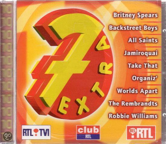 CD-hoes voor '7 Extra' met grote gele en rode cijfers '7'. Artiestenlijst met o.a. Britney Spears, Backstreet Boys.