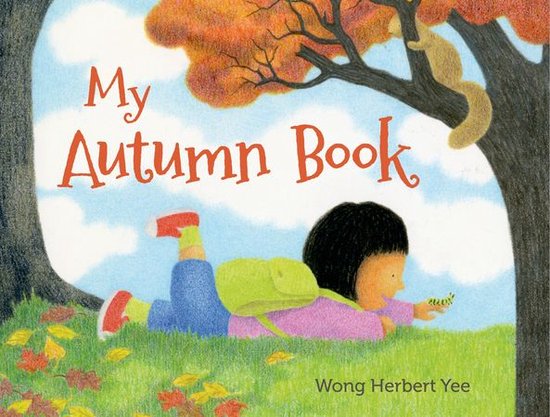 Boek kaft met de titel 'My Autumn Book'. Een kind ligt op gras met een rugzak, kijkend naar een rups. Oranje bladeren en een eekhoorn zijn zichtbaar.
