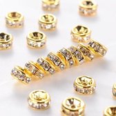 Rhinestone spacer beads, goud met heldere chatons, 8x4mm. Verkocht per 50 stuks !