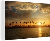 Canvas Schilderij Palmbomen bij zonsondergang - 120x80 cm - Wanddecoratie