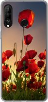 Geschikt voor Huawei P30 Lite hoesje - Kleurrijke lucht boven een veld Klaprozen in Denemarken - Siliconen Telefoonhoesje