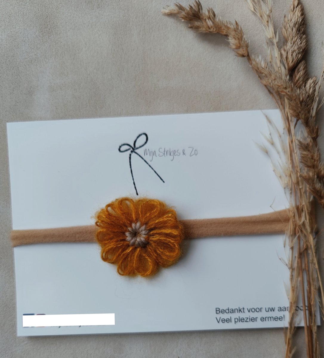Haarband wollen bloem oker