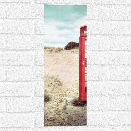 WallClassics - Muursticker - Rode Telefooncel in Duinen - 20x60 cm Foto op Muursticker