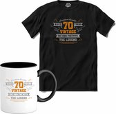 70 Jaar vintage legend - Verjaardag cadeau - Kado tip - T-Shirt met mok - Heren - Zwart - Maat S
