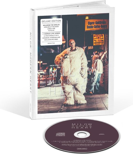 Deluxe editie van 'Modern Heart' met een man in een wit teddybeer kostuum, met een CD en booklet.