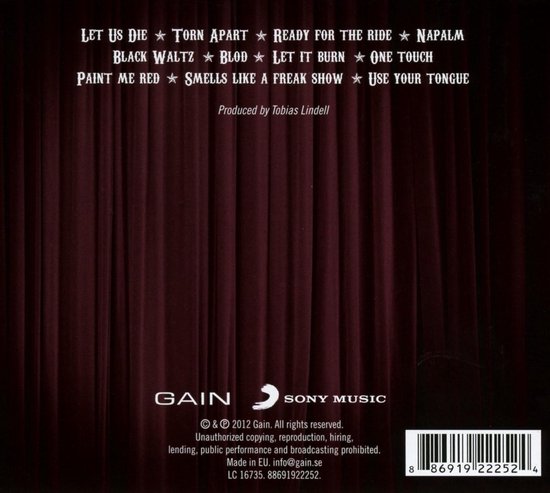 Achterkant cd-hoes met rode gordijnen en tracklist 'Let Us Die', 'Torn Apart', 'Ready for the Ride', 'Napalm', 'Black Waltz', 'Blood', 'Let It Burn', 'One Touch', 'Paint Me Red', 'Smells Like a Freak Show', 'Use Your Tongue'.