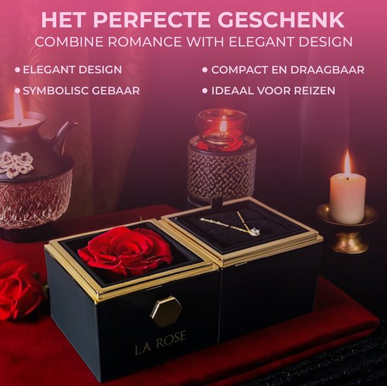 Zwarte juwelendoos met gouden rand, een rode roos en een gouden ketting met zirkonia steen. De doos staat op een rode doek naast een brandende kaars.