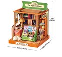 Model van "The Muse Bookshop" met afmetingen: breedte 9,8cm, diepte 9,6cm, hoogte 11,9cm.