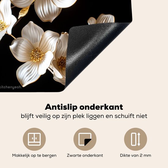 Detail van de achterkant van de snijplank met antislip onderkant en witte en gouden bloemen.