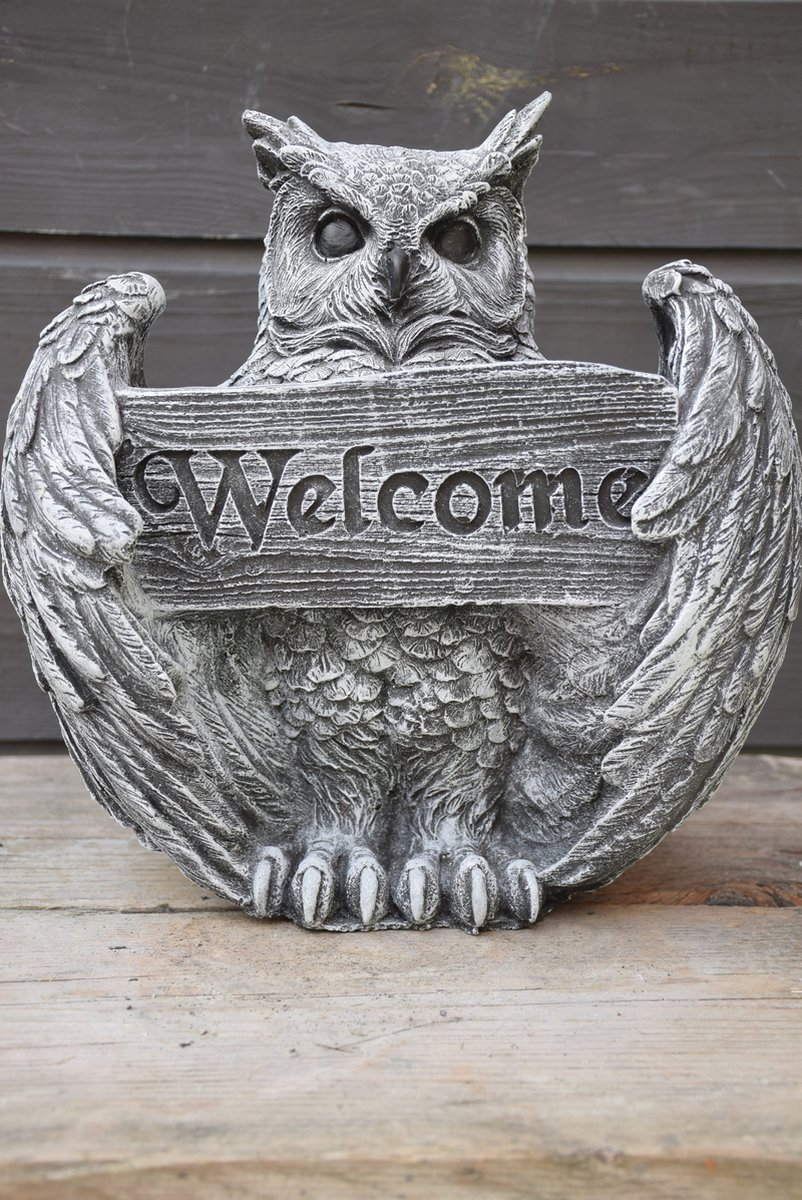 Grote uil met Welcome bord