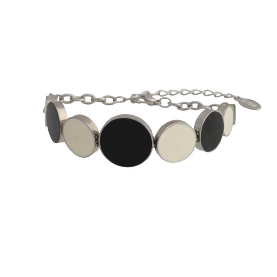 Zilverkleurige armband met afwisselend grote zwarte en crème cirkels en een fijne schakelketting.
