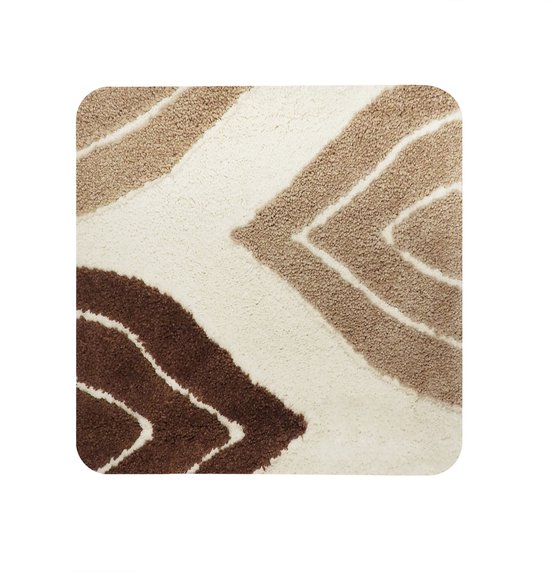 Badmat met een crème, lichtbruine en donkerbruine zigzag print.