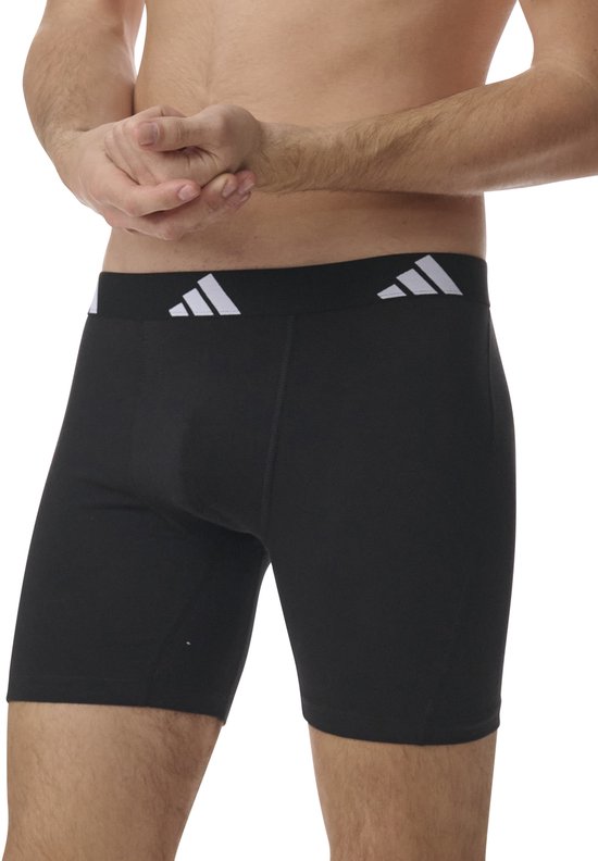 Zwarte boxer met brede zilverkleurige Adidas band, gedetailleerde voorkant.