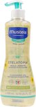 Mustela Stelatopia Cleansing Oil, 500 ml fles met pompje, met zonbloem-motief.