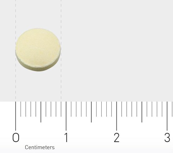 Enkele lichtgele tablet met een liniaal ernaast die de grootte aangeeft: 1 cm.